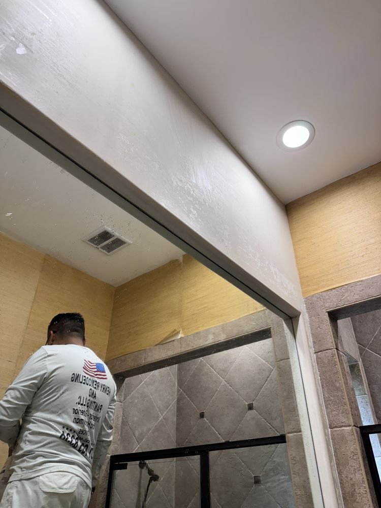 Henry in uniform preparing bathroom drywall repair and patching in Jupiter FL