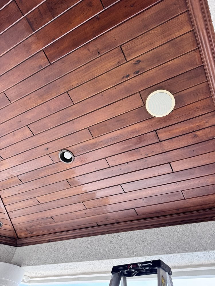Finished tongue and groove wood ceiling with recessed lighting