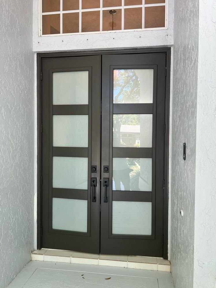 Finished dark bronze exterior double doors with frosted glass in Jupiter FL