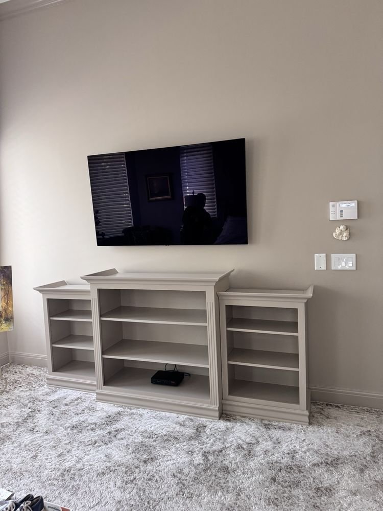TV wall mount installation above painted media console in Jupiter FL
