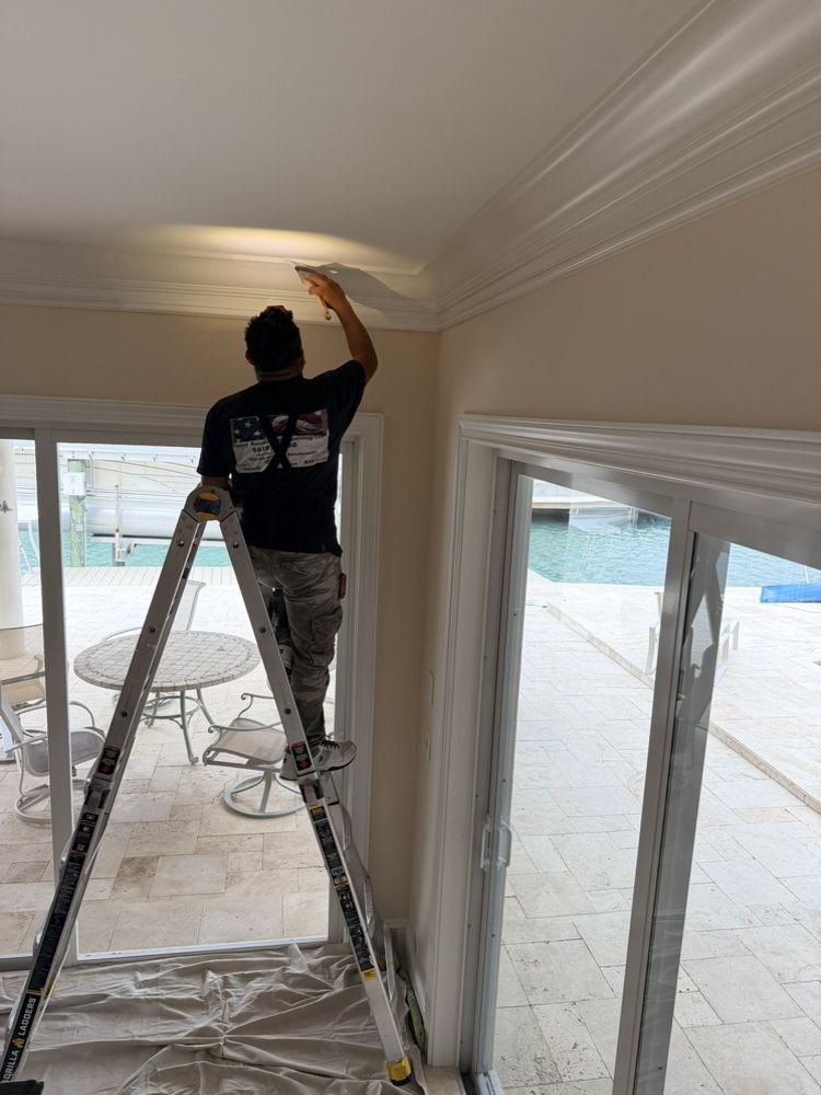 Waterfront residential living room repainting and crown molding in Jupiter FL